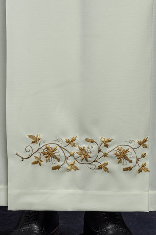 Embroidered priestly alb with a turtleneck and floral pattern in ecru color