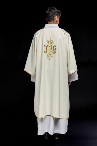 Ecru dalmatic with IHS embroidery and gold-satin trimming