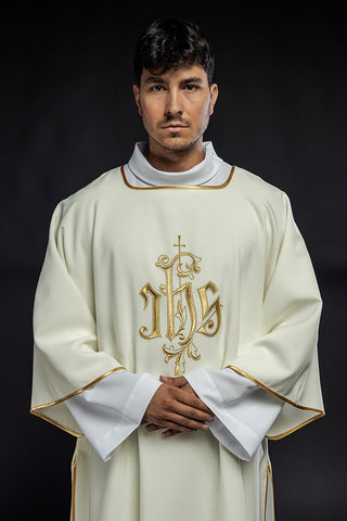 Ecru dalmatic with IHS embroidery and gold-satin trimming