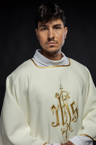 Ecru dalmatic with IHS embroidery and gold-satin trimming