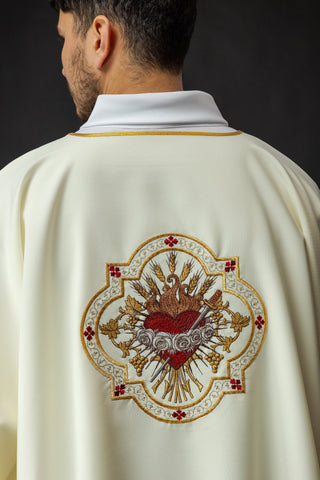 Dalmatic with the motif of the Heart of Mary in ecru color with rich embroidery and stylish finishing