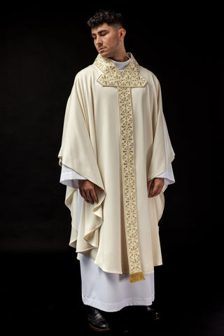 Ecru liturgical chasuble with shiny gold embroidery and satin trimming