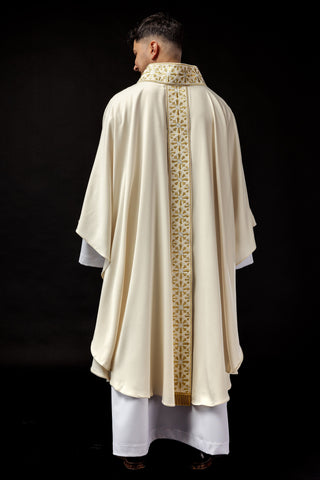 Ecru liturgical chasuble with shiny gold embroidery and satin trimming