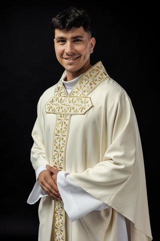 Ecru liturgical chasuble with shiny gold embroidery and satin trimming