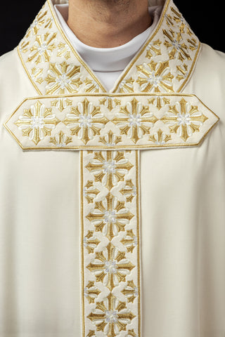 Ecru liturgical chasuble with shiny gold embroidery and satin trimming