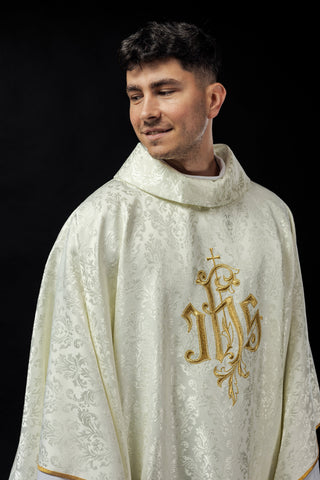 Ecru chasuble with IHS embroidery on decorative fabric