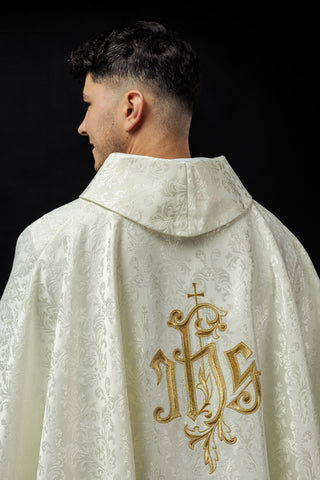 Ecru chasuble with IHS embroidery on decorative fabric