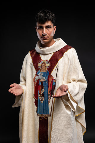 Ecru chasuble with the image of Jesus the Good Shepherd and a burgundy band