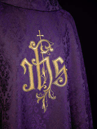 Purple chasuble with embroidered IHS motif on decorative fabric - LITURGICAL SHOP