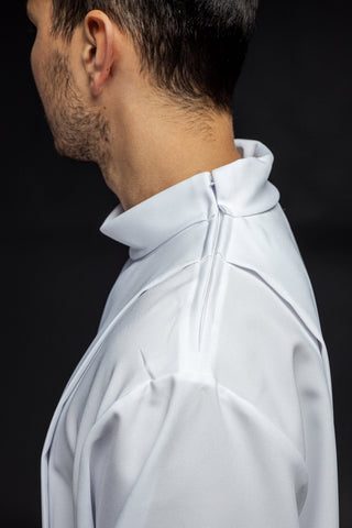 Embroidered priestly alb with a turtleneck and floral pattern in white or ecru