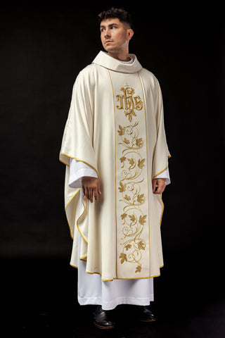 Ecru liturgical chasuble with a floral band and the IHS symbol