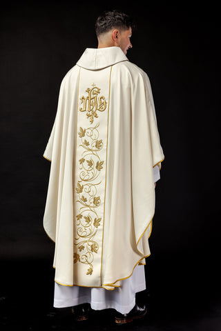 Ecru liturgical chasuble with a floral band and the IHS symbol