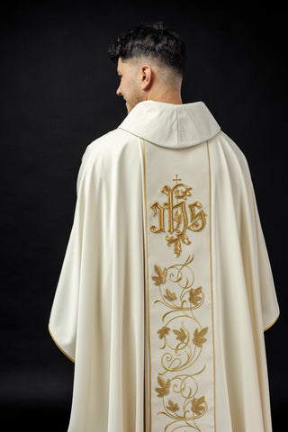 Ecru liturgical chasuble with a floral band and the IHS symbol