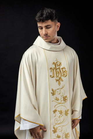 Ecru liturgical chasuble with a floral band and the IHS symbol