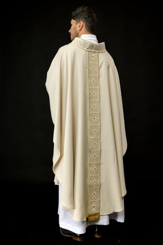 Ecru liturgical chasuble with richly embroidered band and collar