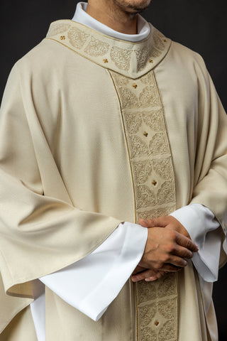 Ecru liturgical chasuble with richly embroidered band and collar