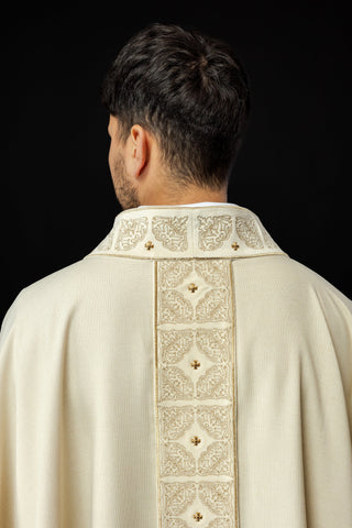 Ecru liturgical chasuble with richly embroidered band and collar