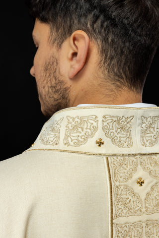 Ecru liturgical chasuble with richly embroidered band and collar