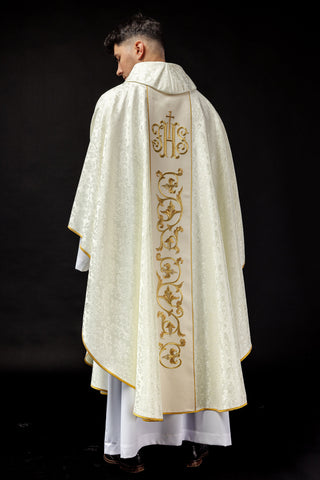 Ecru liturgical chasuble with IHS embroidery and gold trim