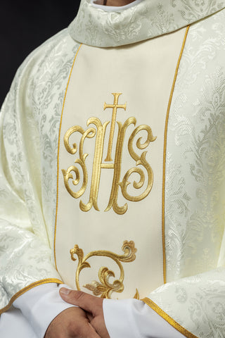 Ecru liturgical chasuble with IHS embroidery and gold trim