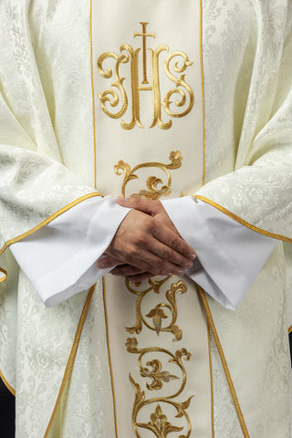 Ecru liturgical chasuble with IHS embroidery and gold trim