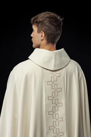 Ecru liturgical chasuble with a richly embroidered band of crosses