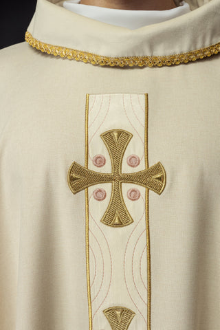 Liturgical chasuble with embroidered gold crosses and trim on the collar in ecru color