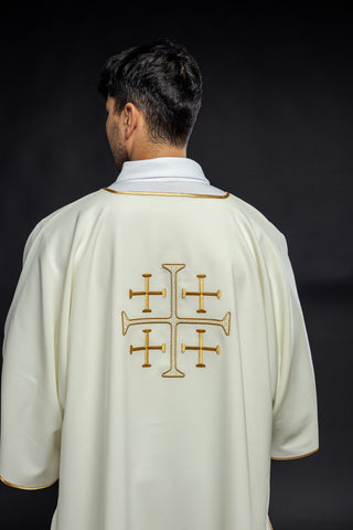 Green dalmatic with embroidered gold crosses and gold satin trim