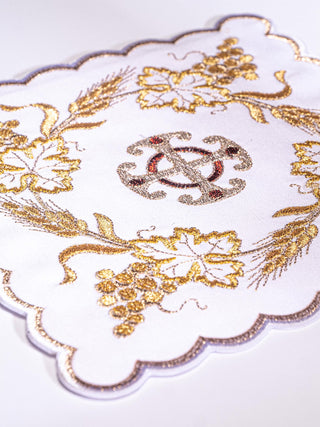 A complete set of chalice linens with rich Eucharistic embroidery