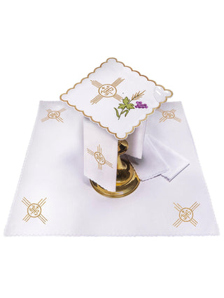 A complete set of chalice linens embroidered with the motif of the Cross and IHS