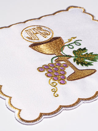 A complete set of chalice linens with Eucharistic embroidery in an elegant package