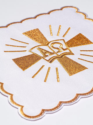 A complete set of chalice linens with Alpha and Omega embroidery and a cross