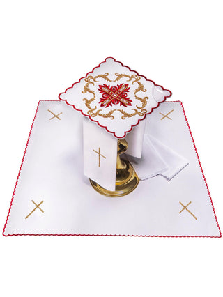 A complete set of chalice linens with red embroidery and a cross motif