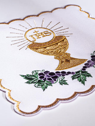 A complete set of chalice linens with colorful Eucharistic embroidery