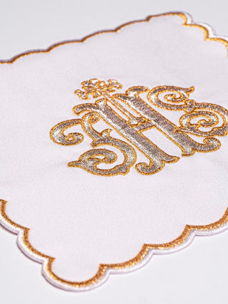 A complete set of chalice linens with gold IHS embroidery