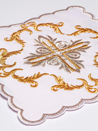 A complete set of chalice linens with gold eucharistic embroidery