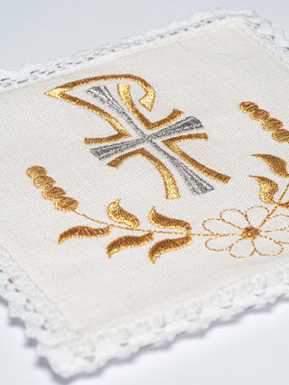 A complete set of chalice linens with the PAX motif and gold embroidery