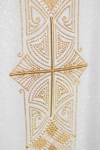 Liturgical chasuble made of shiny fabric with gold embroidery and beads