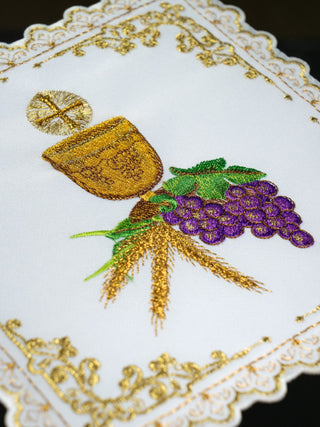 Chalice set with a motif of a chalice, grapes, wheat, and host - handcrafted, richly decorated, perfect for religious ceremonies