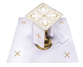 Chalice set with a cross motif and decorative floral embroidery for priests