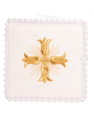 A set of linen chalice linens with embroidered golden crosses