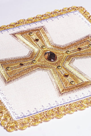 A set of linen chalice linens with embroidery and stones