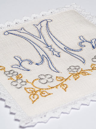 A set of linen chalice linens with Marian embroidery