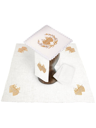 A set of linen chalice linens with gold Eucharistic embroidery