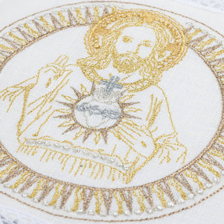 A set of linen embroidered chalice linens with the motif of the Sacred Heart of Jesus