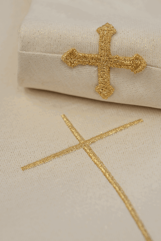 Ecru liturgical chasuble with an embroidered cross and gold-satin trimming