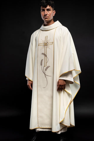 Ecru liturgical chasuble with an embroidered cross and the IHS symbol