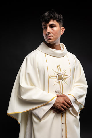 Ecru liturgical chasuble with an embroidered cross and the IHS symbol