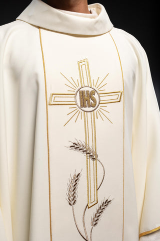 Ecru liturgical chasuble with an embroidered cross and the IHS symbol