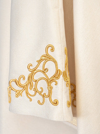 Liturgical chasuble with an embroidered golden Marian emblem